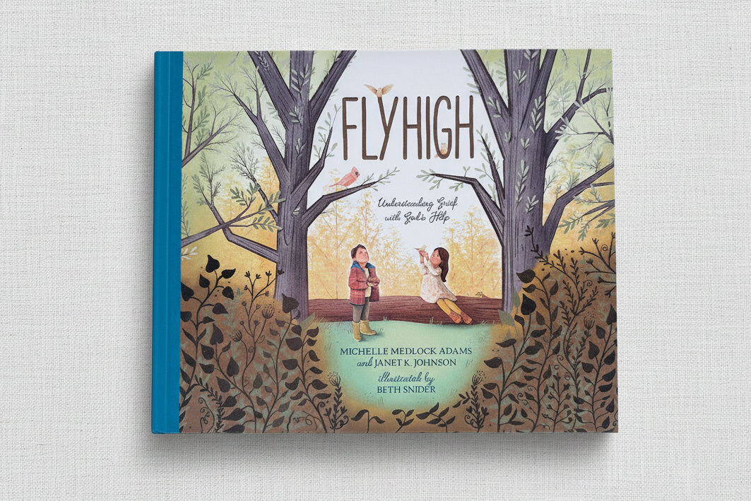 Book titled 'Flyhigh' with illustration of two children and trees