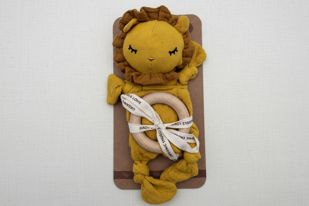 Plush lion toy with a wooden ring