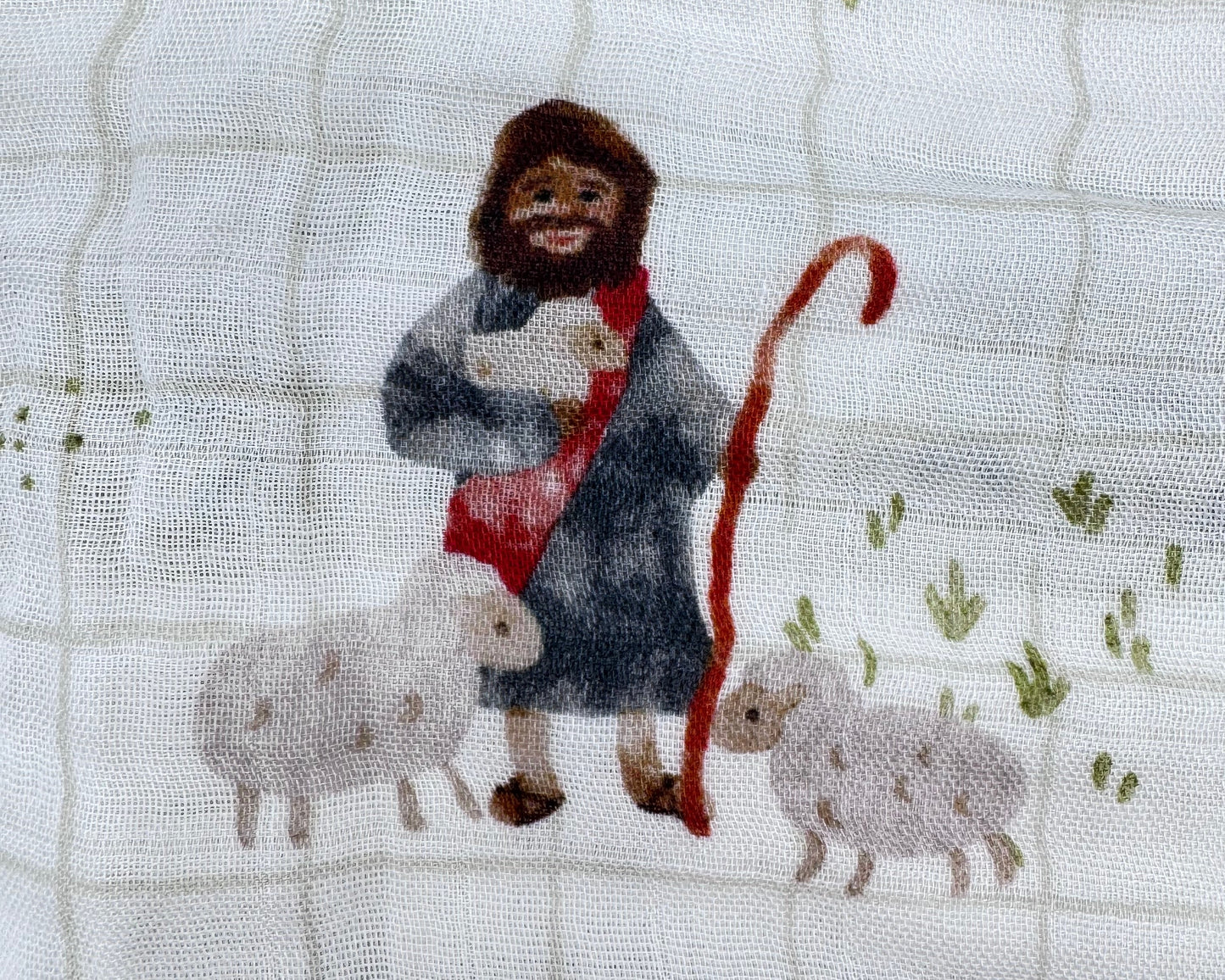 Fabric with a shepherd and sheep design
