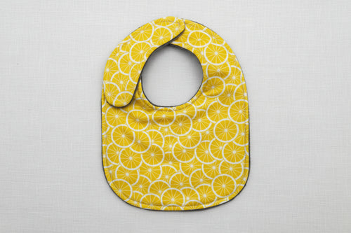 Load image 1 in gallery view. Baby bib with lemon pattern 