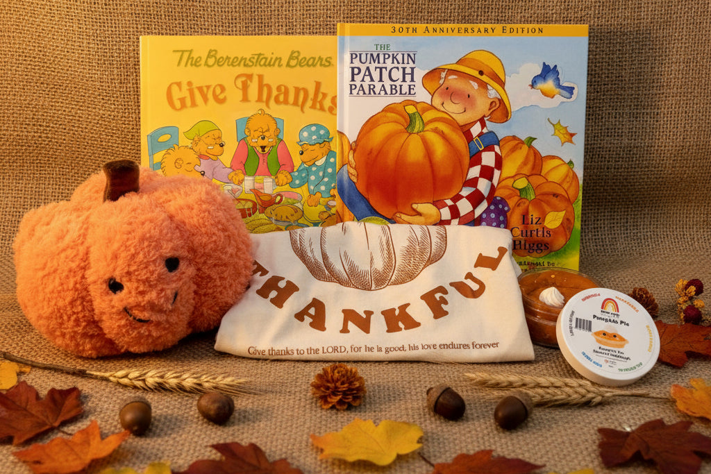 Children's Books, a child's t-shirt, a pumpkin plush, and pumpkin sensory dough 