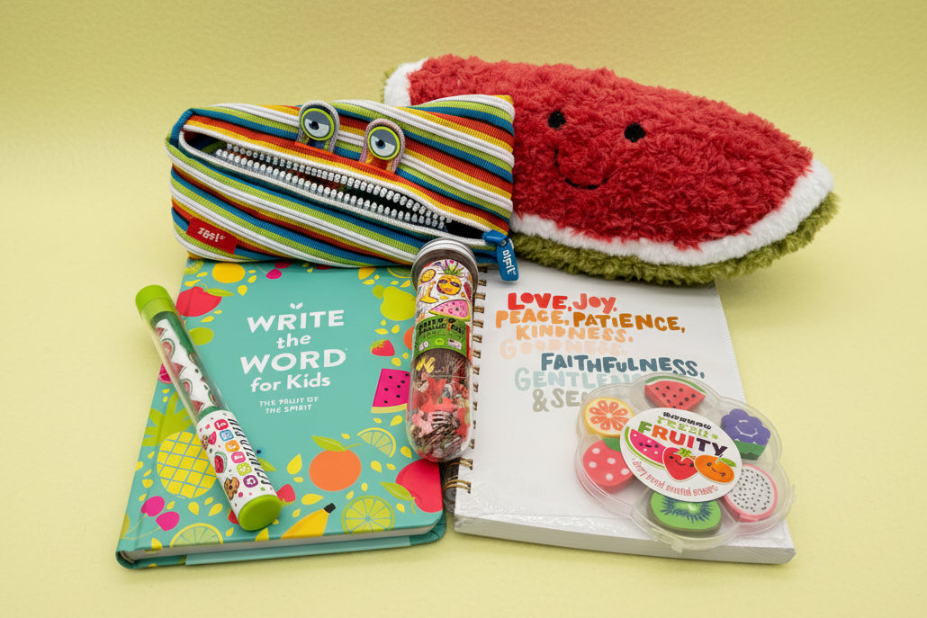 Children's items with a watermelon plush toy, notebook, book, puzzle and pen 