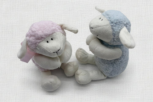 Load image 1 in gallery view. Two plush sheep toys, one pink and one blue