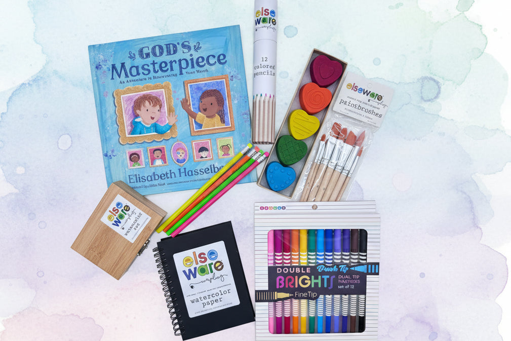 Book titled 'God's Masterpiece' and art supplies on a yellow background.