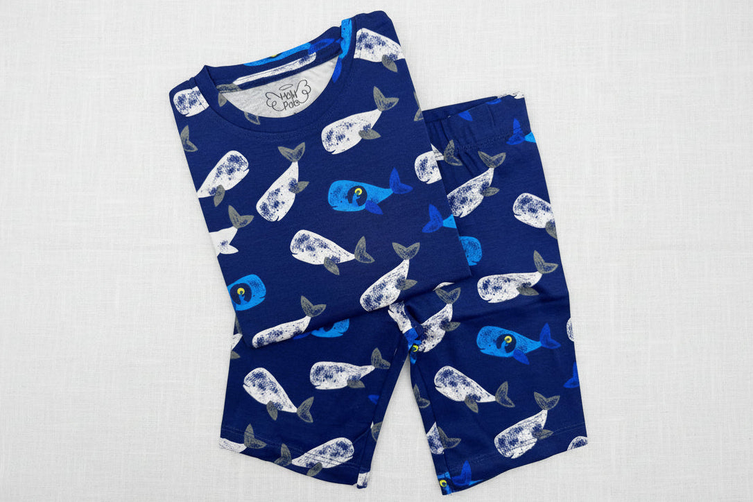 Children's navy blue pajama set with whale pattern 