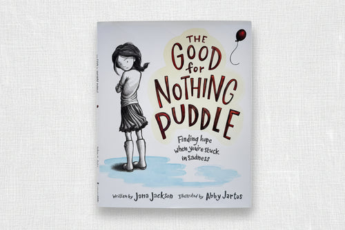Load image 1 in gallery view. Book cover of 'The Good for Nothing Puddle' with a girl standing in a puddle.