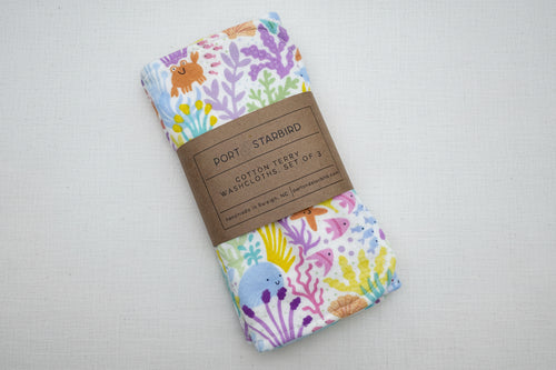 Load image 1 in gallery view. Set of three colorful cotton washcloths with marine animal pattern 