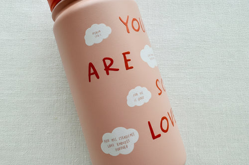 Load image 1 in gallery view. Pink water bottle with scripture text and cloud graphics