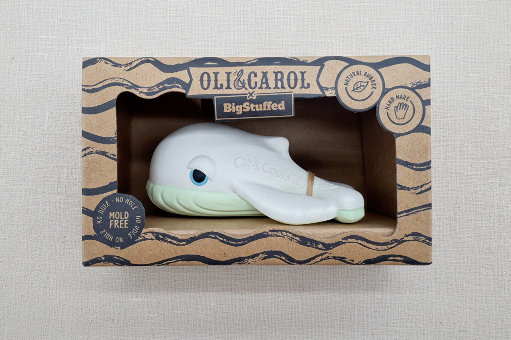 Rubber whale toy in a cardboard packaging
