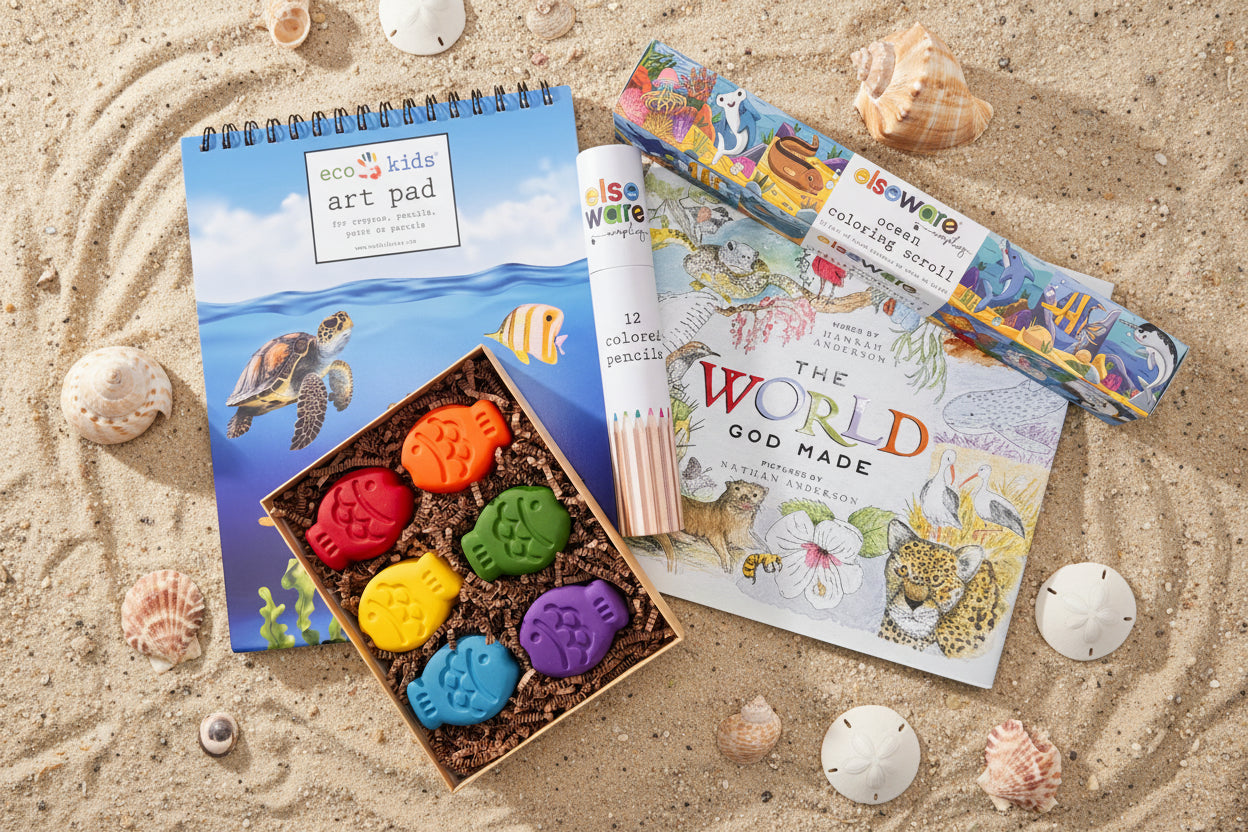Colorful fish shaped crayon set with art supplies and "The World God Made" book